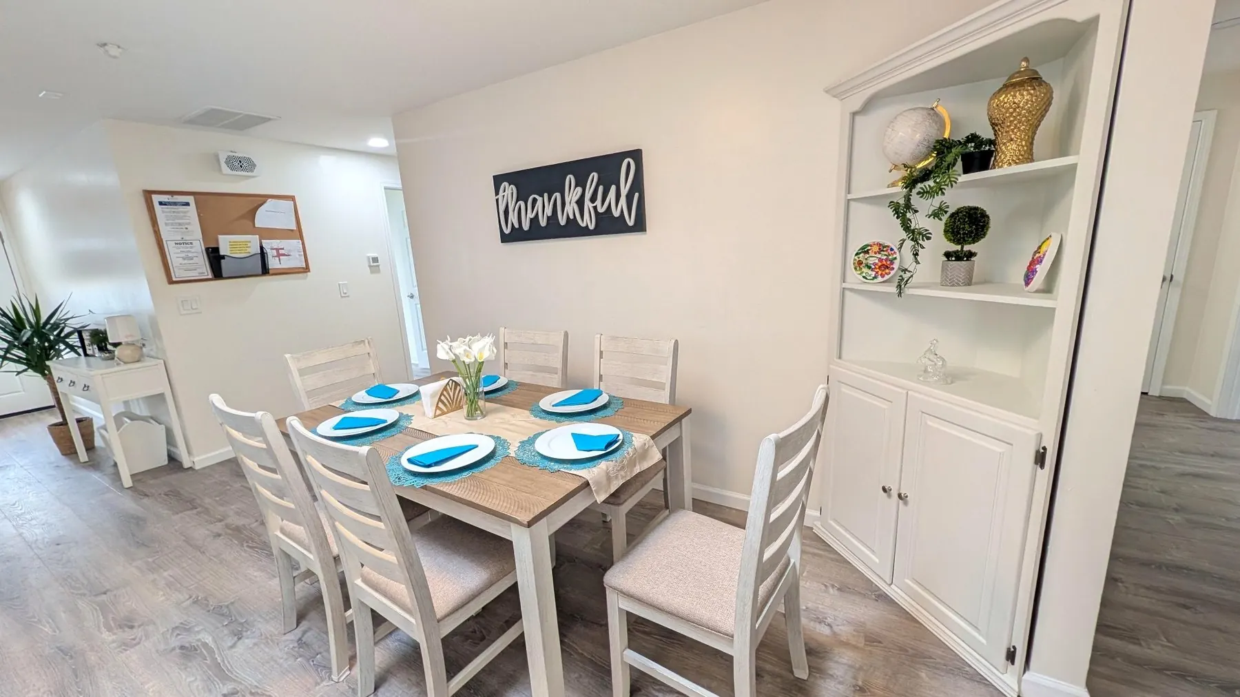 Dining area and personal shelf space at Rest Assured AFH