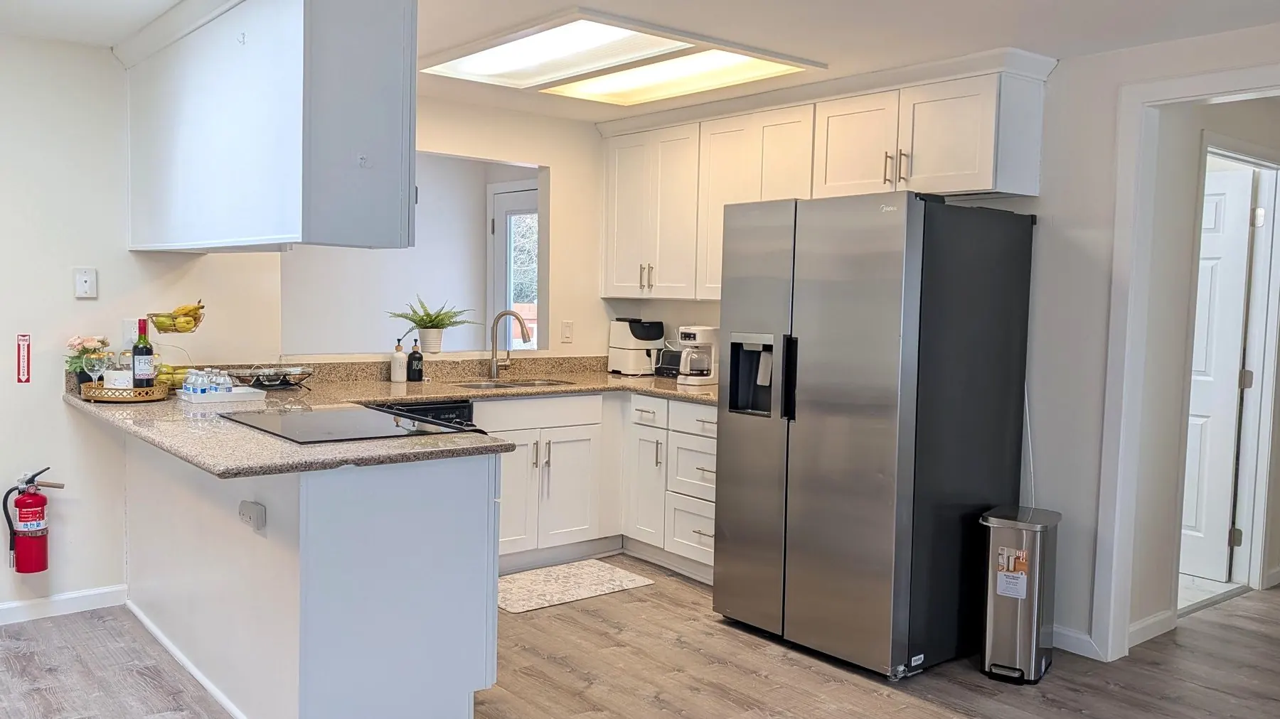 Clean kitchen used for home-style care and meals at Rest Assured AFH